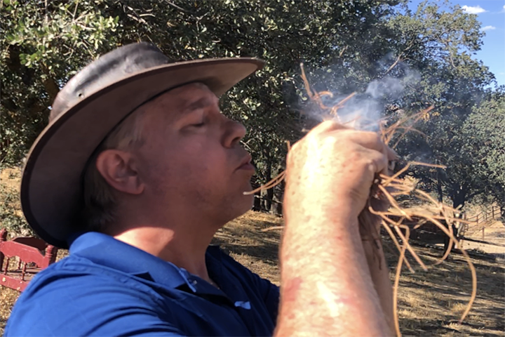 Blowing into flame